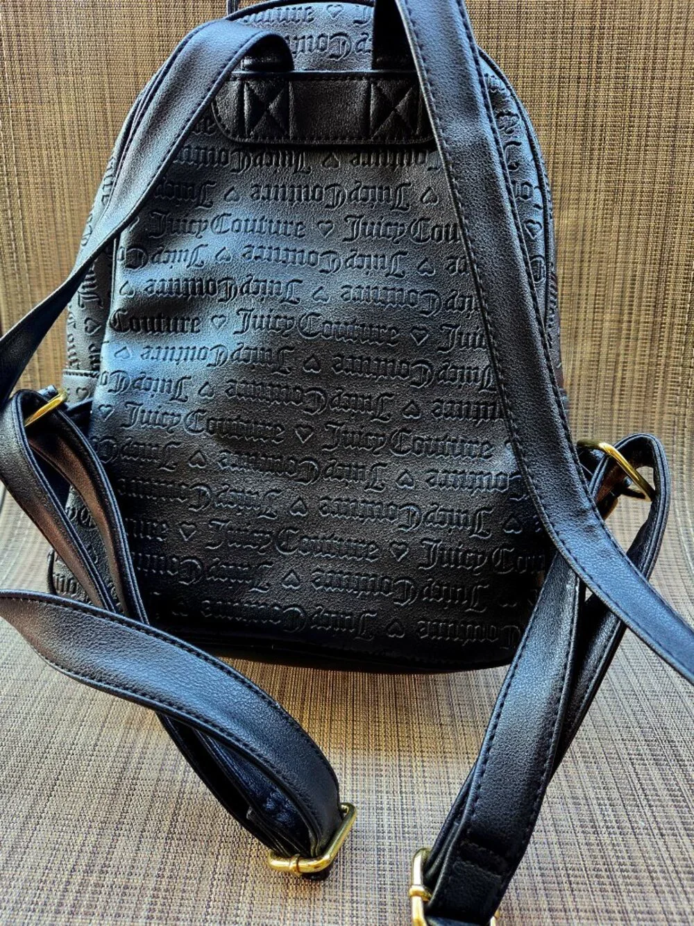 Juicy Couture Debossed Faux Leather Backpack With Gold Hardware